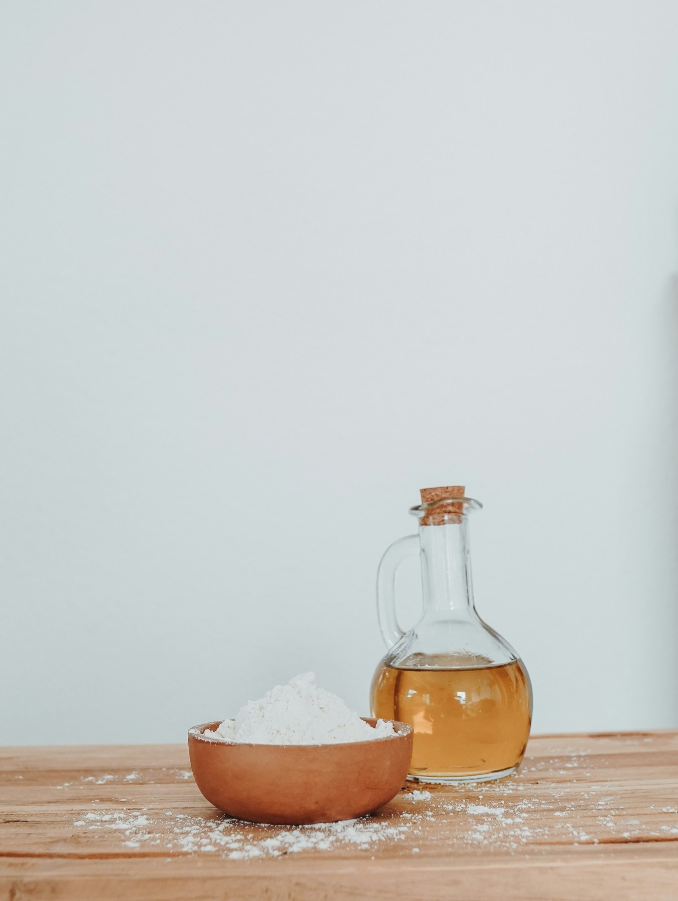 A glass bottle of golden cooking oil